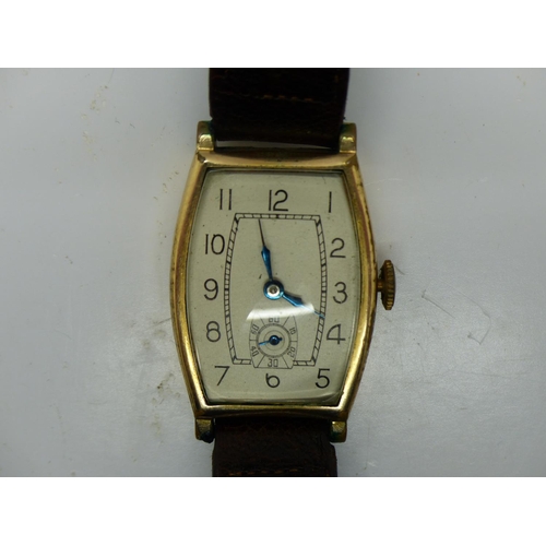 154 - Gents Swiss made 15 jewel wristwatch in a gold filled case with subsidiary seconds dial on a brown l... 