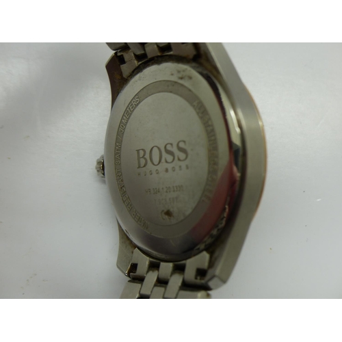 156 - Boss by Hugo Boss gents wristwatch with date aperture on a stainless steel bracelet, boxed, not work... 