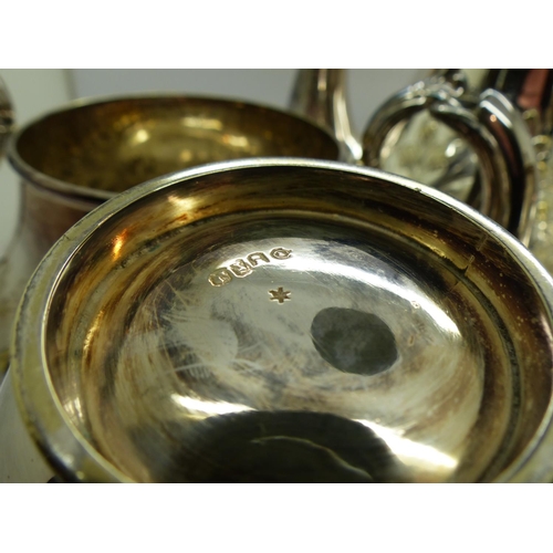 172 - Silver plated four piece tea set. UK P&P Group 3 (£30+VAT for the first lot and £8+VAT for subsequen... 