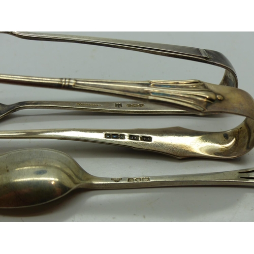 179 - Two hallmarked silver tongs and one silver spoon, combined 58g. UK P&P Group 1 (£16+VAT for the firs... 