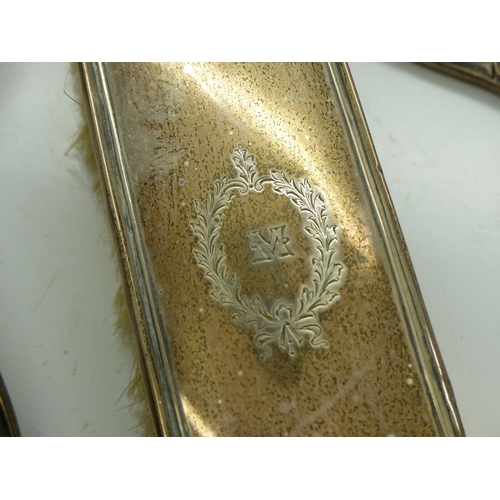 189 - Hallmarked silver mirror and brushes, mirror L: 27 cm. UK P&P Group 2 (£20+VAT for the first lot and... 