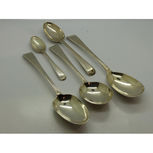 194 - Five Mappin & Webb hallmarked silver spoons, London assay, 296g . UK P&P Group 1 (£16+VAT for the fi... 