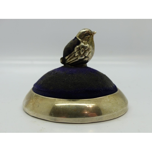 196 - Edwardian hallmarked silver pin cushion by Levi & Salaman, in the form of a seated chick on a circul... 