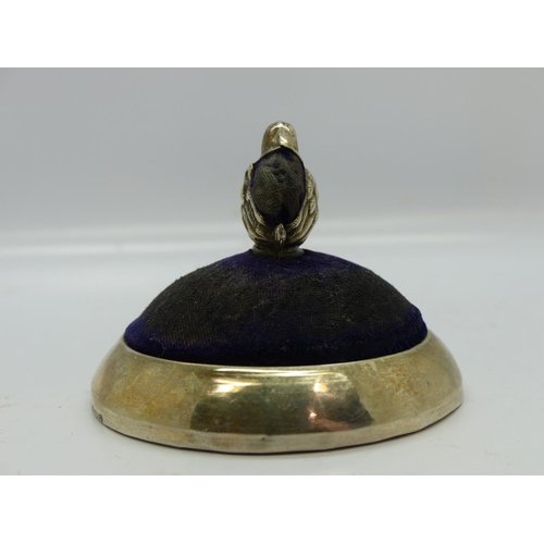 196 - Edwardian hallmarked silver pin cushion by Levi & Salaman, in the form of a seated chick on a circul... 