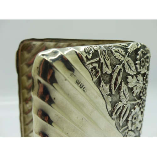 201 - Victorian hallmarked silver card case with floral decoration in relief, Birmingham assay 1890, 100 x... 