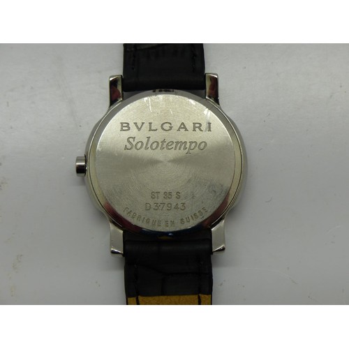 168 - Bulgari Solotempo gents quartz wristwatch with date aperture, on a black leather strap, with inner a... 