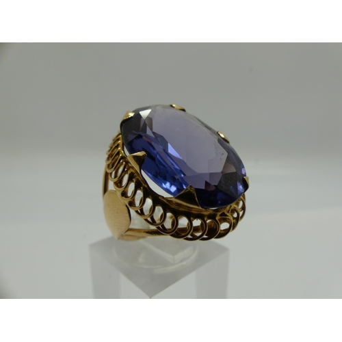 70 - Impressive 14ct gold solitaire ring, set with a large oval-cut sapphire, size M/N, 6.7g, stone 20 x ... 