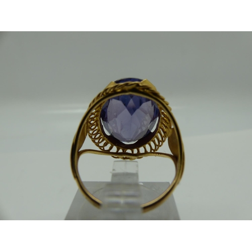 70 - Impressive 14ct gold solitaire ring, set with a large oval-cut sapphire, size M/N, 6.7g, stone 20 x ... 