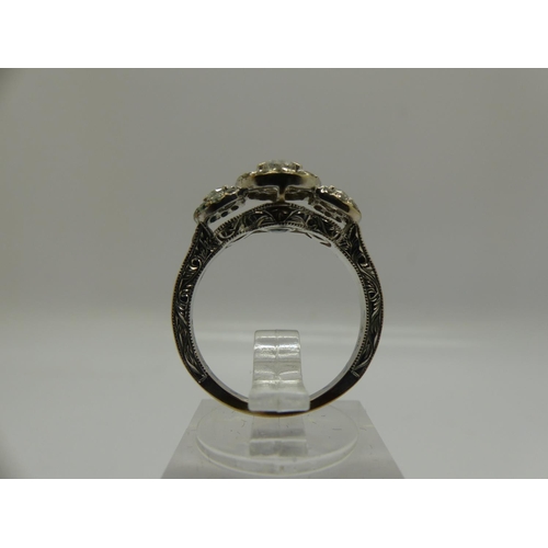 72 - 14ct gold diamond set ring, with central stone (0.25ct) flanked by further diamonds and an aquamarin... 