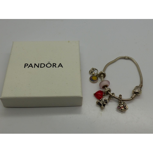 94 - Pandora Disney bracelet with five Disney charms, with box and bag, L: 18 cm. UK P&P Group 1 (£16+VAT... 