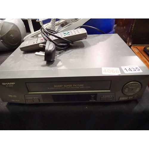 1435 - Sharp VC-M303 VHS recorder. All electrical items in this lot have been PAT tested for safety and hav... 