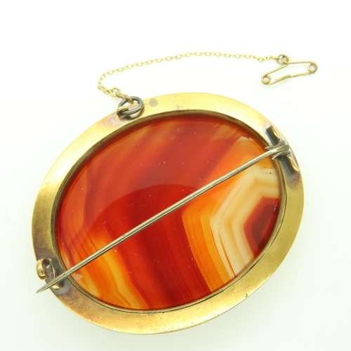 22 - Large Victorian unmarked high-carat gold brooch, set with banded agate, 67 x 55 mm, 35g. UK P&P Grou... 