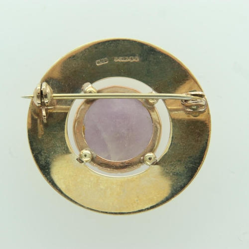 27 - 9ct gold brooch with purple stone, D: 30 mm, 4.9g. UK P&P Group 0 (£6+VAT for the first lot and £1+V... 