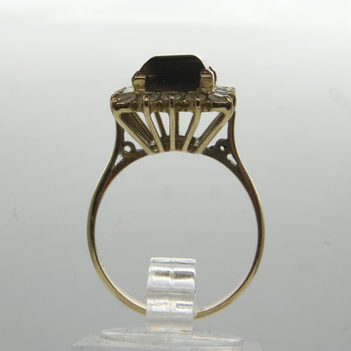 41 - 14ct gold ring set with large panel of smokey quartz surrounded by topaz, size O, 4.5g. UK P&P Group... 