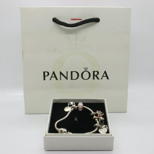 94 - Pandora Disney bracelet with five Disney charms, with box and bag, L: 18 cm. UK P&P Group 1 (£16+VAT... 