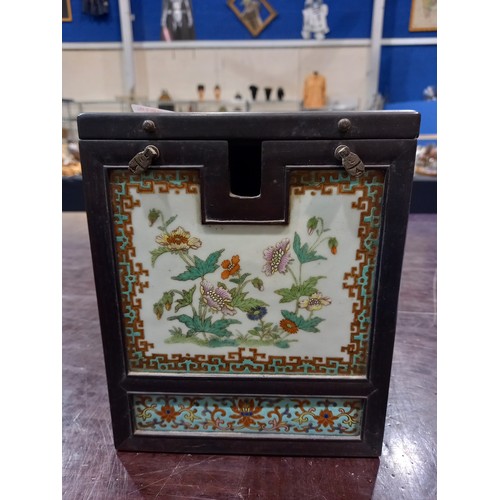 367 - Oriental metal bound tiled box with wooden interior, top tile cracked, 16 x 16 x 20 cm. Crack across... 