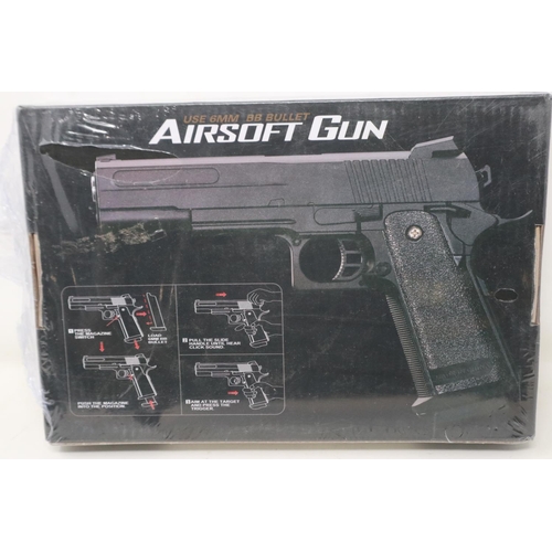 2065 - New old stock airsoft pistol, model V19 in tan, boxed. UK P&P Group 1 (£16+VAT for the first lot and... 