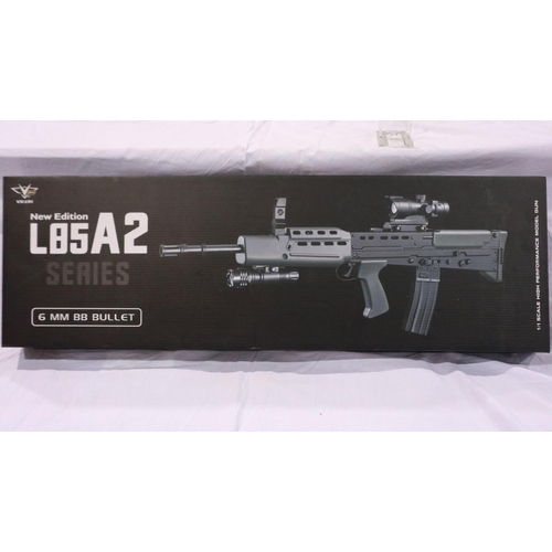 2068 - New old stock spring powered 6mm BB rifle in black/green (L85 A1 style), boxed. UK P&P Group 3 (£30+... 