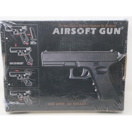 2076 - New old stock airsoft pistol, model V20 in brown, boxed and factory sealed. UK P&P Group 1 (£16+VAT ... 