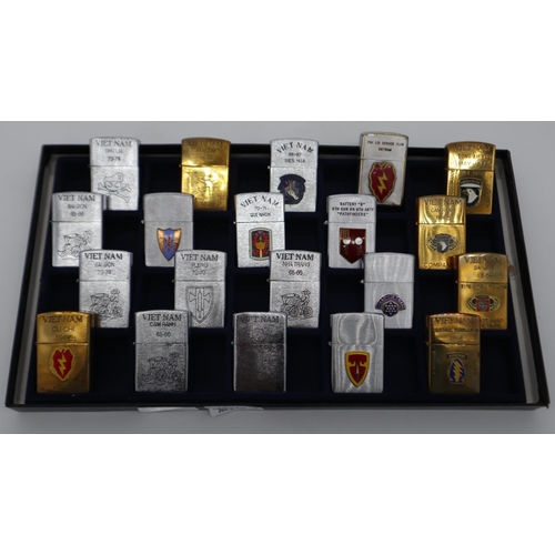 2093 - A set of twenty replica windproof lighters, each in the manner of Vietnam period American Zippo ligh... 