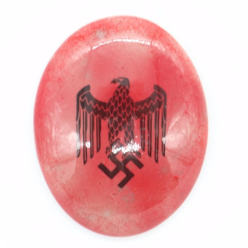 2104 - German WWII ceramic oval Swastika plaque, H: 70 mm. UK P&P Group 1 (£16+VAT for the first lot and £2... 