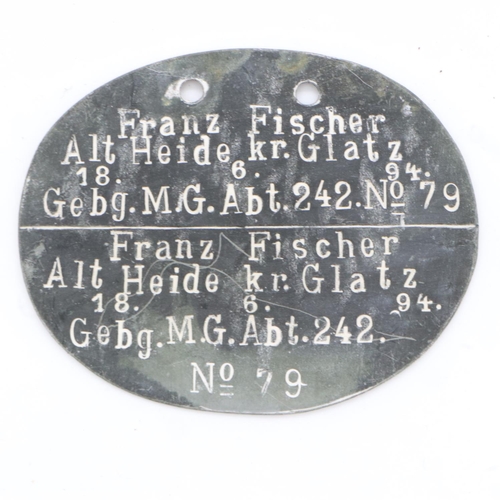 2181 - WWI Imperial German Dog Tag to a Machine Gunner in a Mountain Troop. UK P&P Group 1 (£16+VAT for the... 