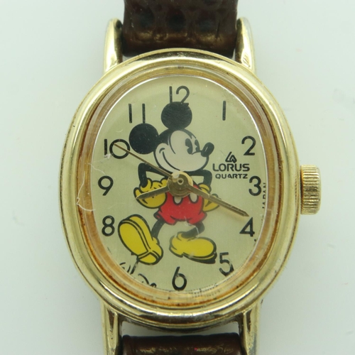 106 - LORUS: 1990 official Disney World Florida ladies wristwatch on a brown leather strap, requires batte... 