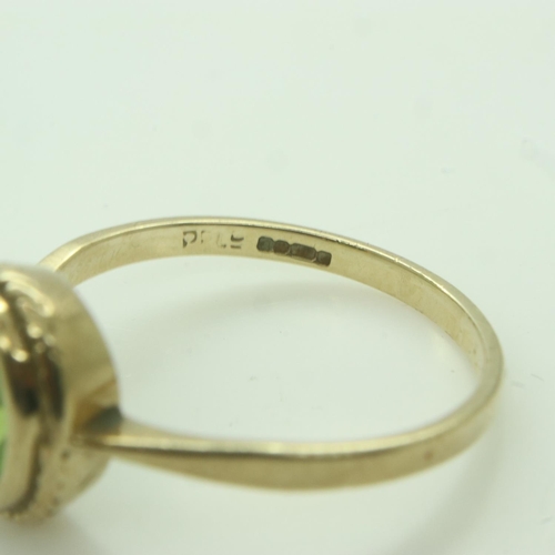 19 - 9ct gold ring set with a peridot, size O/P, 2.0g. UK P&P Group 0 (£6+VAT for the first lot and £1+VA... 