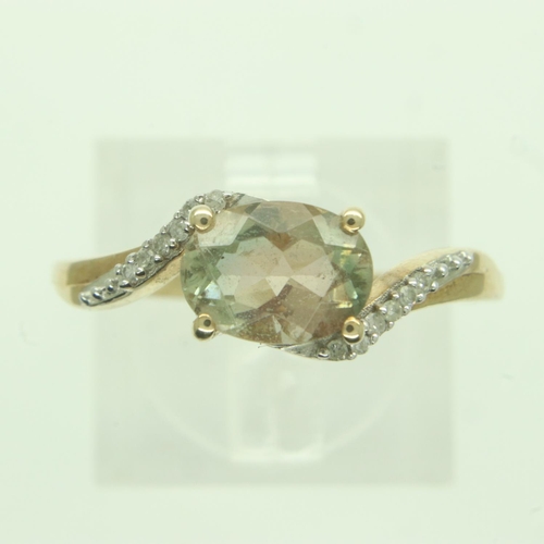 23 - 9ct gold tourmaline ring set with diamond shoulders, size S, 2.7g. UK P&P Group 1 (£16+VAT for the f... 