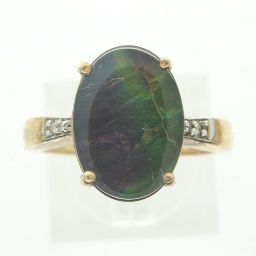 31 - 9ct gold ring set with a faux black opal, size O/P, 4.0g. UK P&P Group 0 (£6+VAT for the first lot a... 