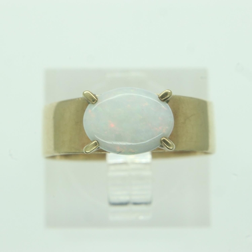 56 - 9ct gold opal solitaire ring, opal 8 x 6 mm, size Q, 2.0g. UK P&P Group 0 (£6+VAT for the first lot ... 
