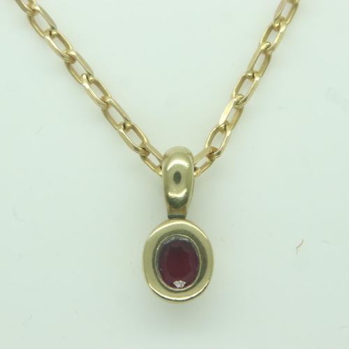 57 - 18ct gold chain with ruby set pendant, L: 48 cm, 6.0g.  UK P&P Group 0 (£6+VAT for the first lot and... 
