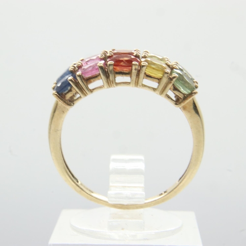 76 - 9ct gold ring set with multi-coloured natural sapphires, size O, 2.6g. UK P&P Group 0 (£6+VAT for th... 