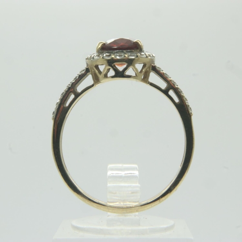 77 - 9ct gold garnet and white stone set ring, size Q, 3.4g. UK P&P Group 1 (£16+VAT for the first lot an... 
