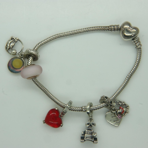 90 - Pandora Disney bracelet with five Disney charms, with box and bag, L: 18 cm. UK P&P Group 1 (£16+VAT... 