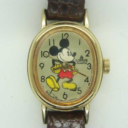 106 - LORUS: 1990 official Disney World Florida ladies wristwatch on a brown leather strap, requires batte... 