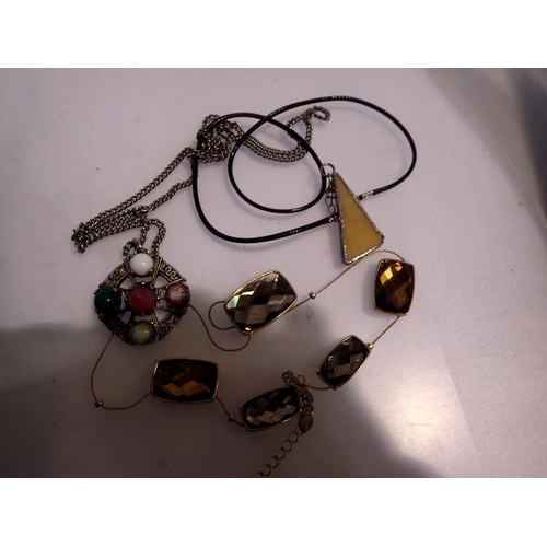 1103 - Four necklaces, including a Scottish hardstone example. UK P&P Group 1 (£16+VAT for the first lot an... 