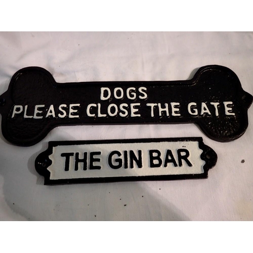 1219 - Two cast iron signs: 'The Gin Bar' and 'Dogs, please close the gate' approx. 40cm (l) for the larges... 