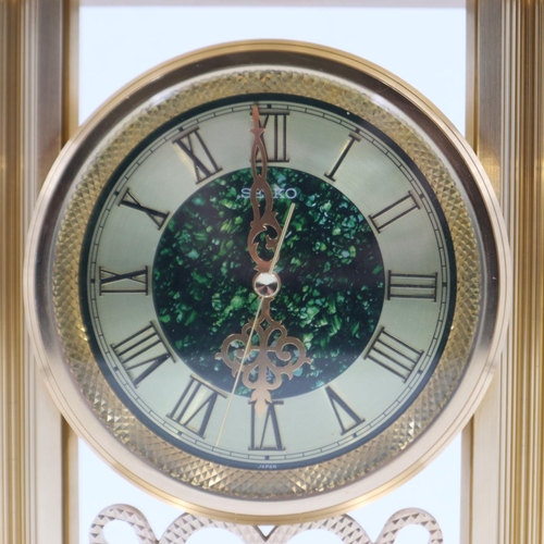 A high grade Seiko faux malachite and gold tone mantle clock