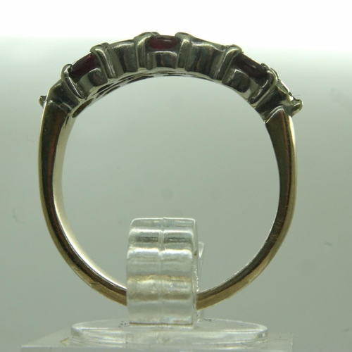 52 - 9ct gold ruby and diamond set ring, size N/O, 4.3g. UK P&P Group 0 (£6+VAT for the first lot and £1+... 