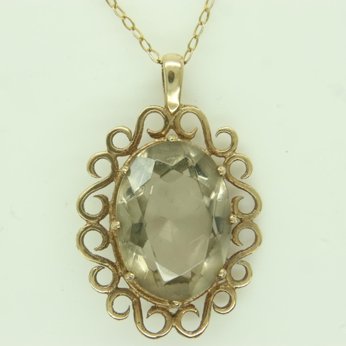 67 - 9ct gold pendant necklace, set with a large faceted topaz, drop L: 35 mm, 5.9g. UK P&P Group 0 (£6+V... 