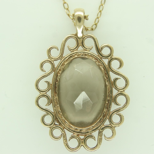 67 - 9ct gold pendant necklace, set with a large faceted topaz, drop L: 35 mm, 5.9g. UK P&P Group 0 (£6+V... 