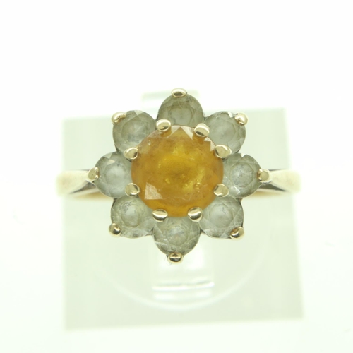 78 - 9ct gold stone set daisy-head ring, size J/K, 2.9g. UK P&P Group 0 (£6+VAT for the first lot and £1+... 