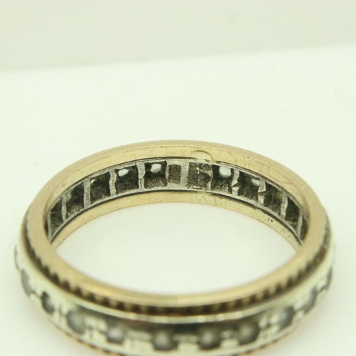 84 - 9ct white and yellow gold eternity ring set with white topaz, size J/K, 2.9g. UK P&P Group 0 (£6+VAT... 