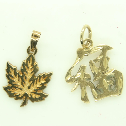 93 - Two 10ct gold charms, 2.1g. UK P&P Group 0 (£6+VAT for the first lot and £1+VAT for subsequent lots)