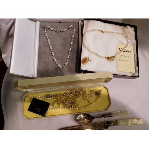 1080 - Hallmarked silver knife and spoon with and three pearl necklaces, simulated types. UK P&P Group 2 (£... 