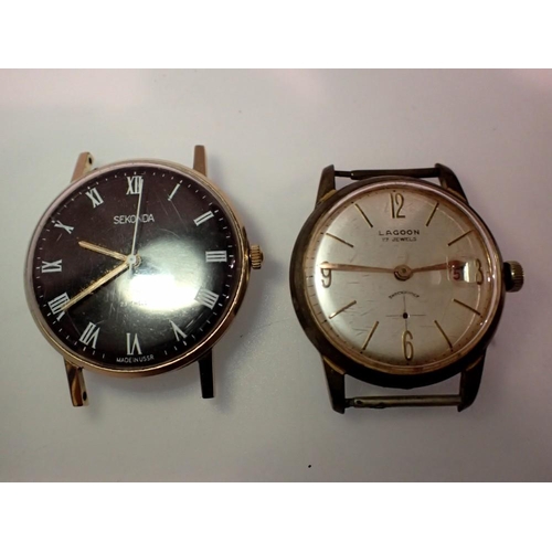 1091 - Two mechanical wristwatches, no straps, Lagoon and Sekonda. UK P&P Group 1 (£16+VAT for the first lo... 