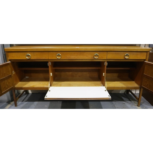 2044 - Nathan Squares sideboard, two short and one long drawer over two cupboards and a drop down door, wit... 