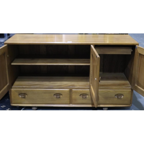 2046 - Ercol Windsor Golden Dawn asymmetric sideboard of three cupboard doors above two drawers, 130 x 44 x... 