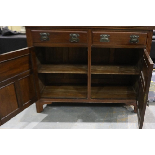 2062 - Art Nouveau period walnut buffet with two drawers over two cupboard doors, 122 x 41 x 109 cm H. Not ... 